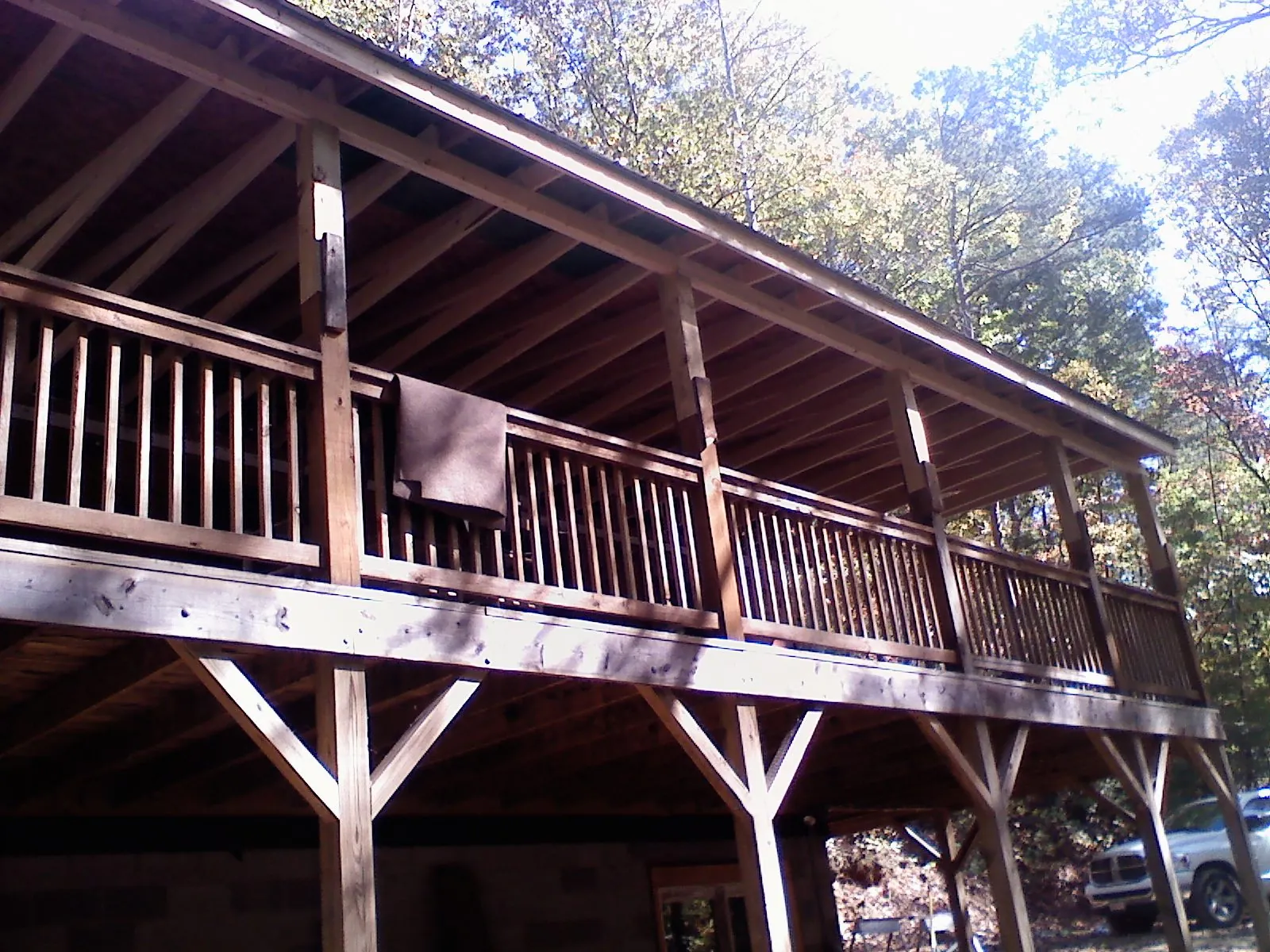 Timber framing under a new elevated porch and deck — Roof Leak Repair in Belmond by Roofing Brothers